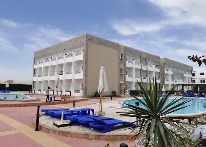 Furnished & Kitchen Seaview Beachfront Near Airport Apartment